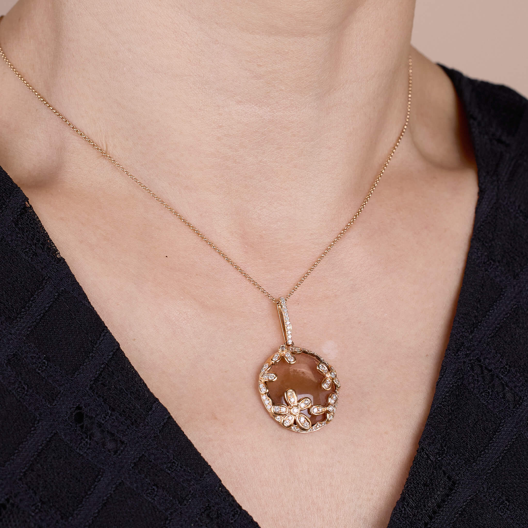 Floral circular pendant