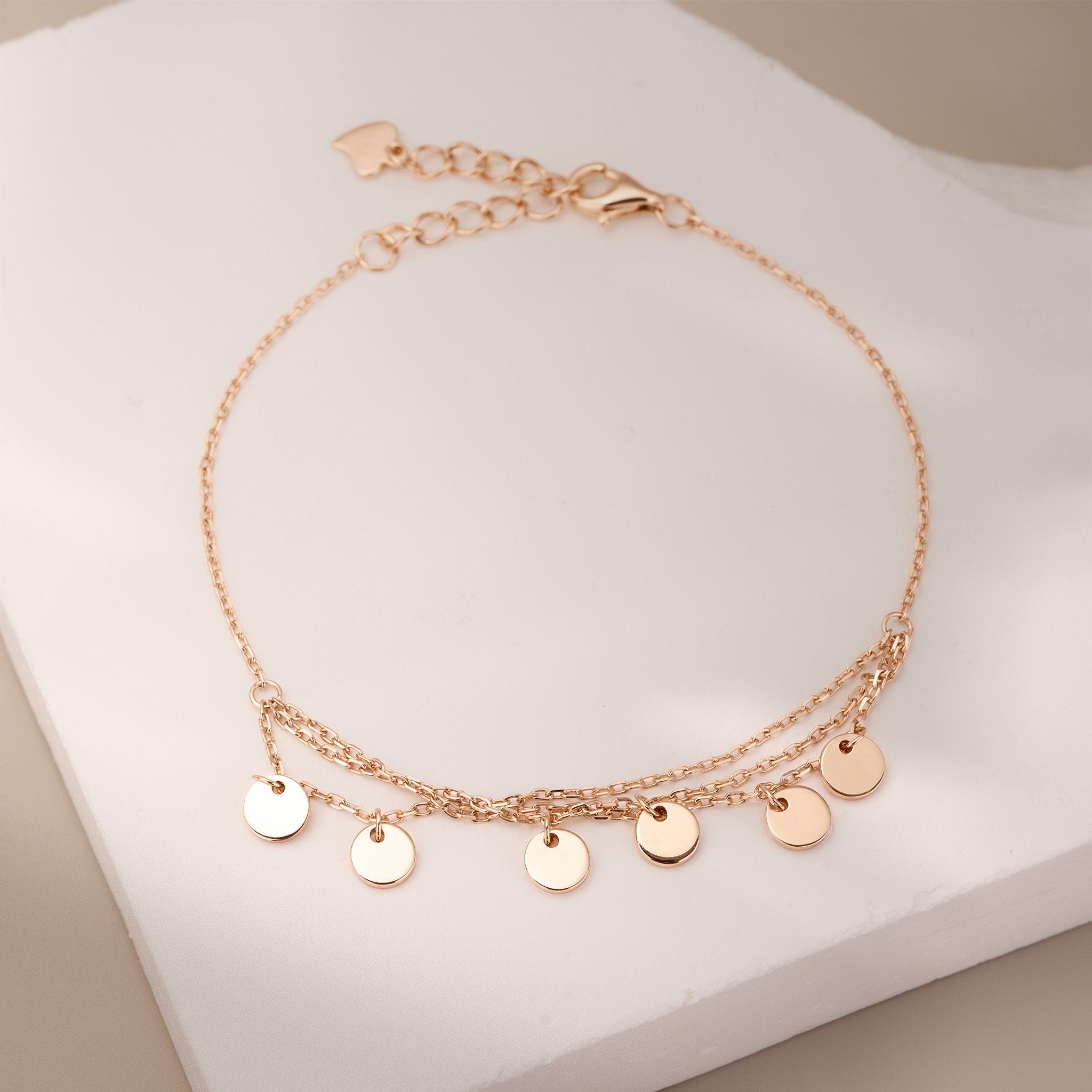 Disc charm bracelet